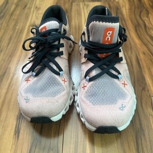 On Running Peach and Black Athletic Shoes